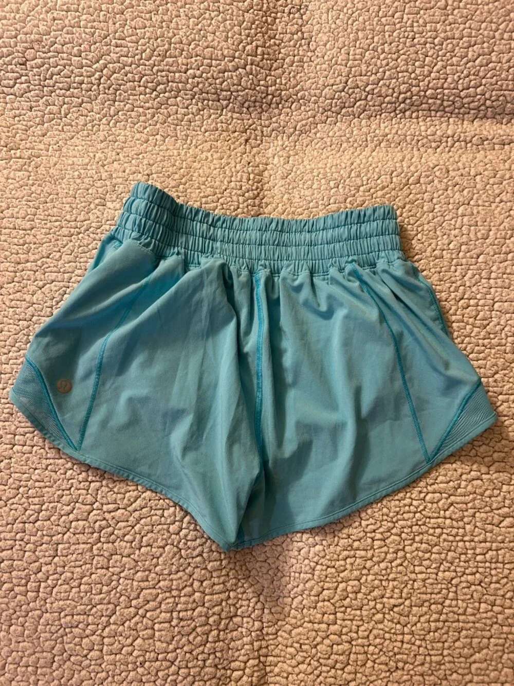 Lululemon -- light blue, flowy running shorts, shorts underneath